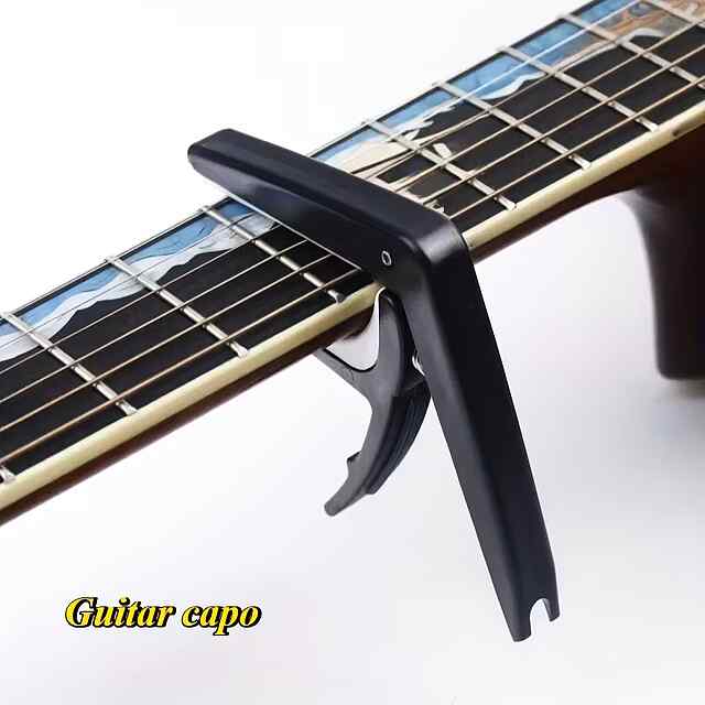 Каподастр 2-в-1 з підйомником струн: надійність  комфорт для гітари????