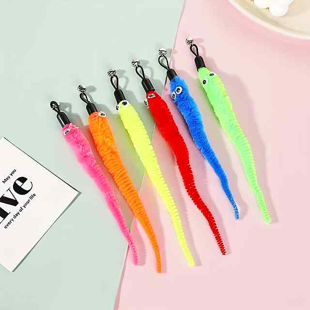 Іграшка для котів з пір'ям на жердині   4 випадкові насадки! Всмоктувальна присоска - 1 фото товару