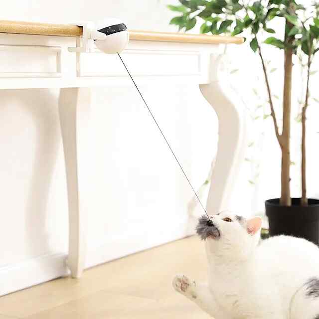 Інтерактивна іграшка-кулька YoYo для кішок з підйомом та обертанням, біла - 3 фото товару