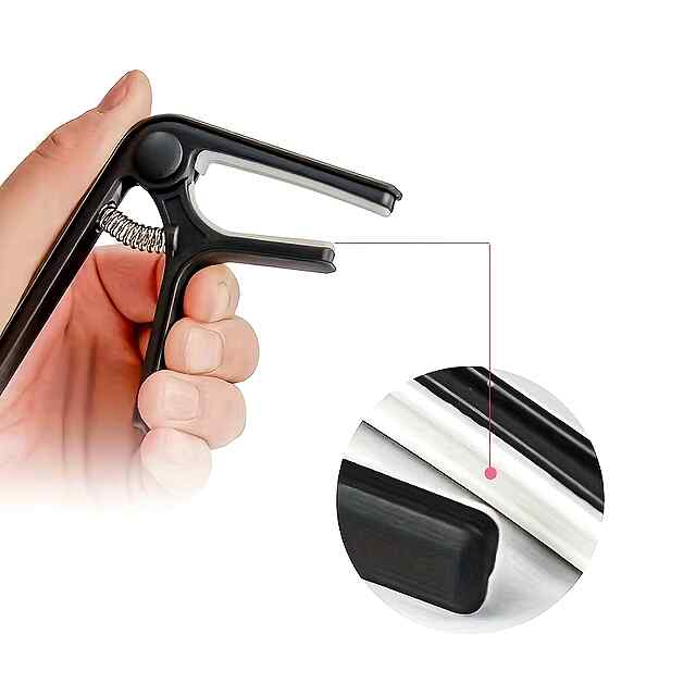 Каподастр для гітари, рожевий, ABS-пластик. Зміна тональності швидко та легко. Компактний, вага 70г. Для акустичної та електричної гітари. - 2 фото товару