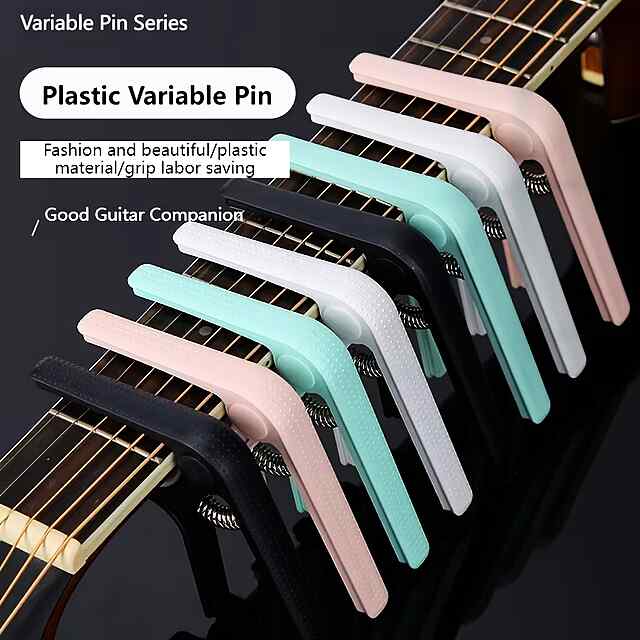 Каподастр для гітари, рожевий, ABS-пластик. Зміна тональності швидко та легко. Компактний, вага 70г. Для акустичної та електричної гітари. - 3 фото товару