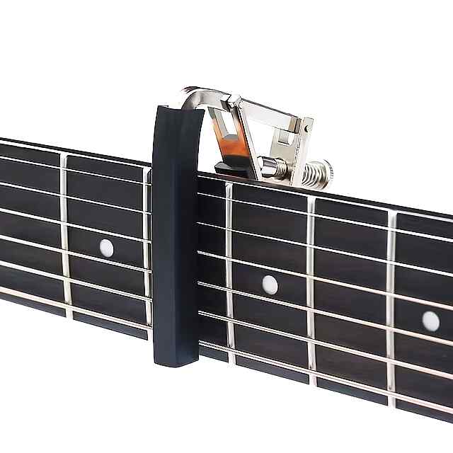 Каподастр для гітари, універсальний аксесуар для музиканта - 1 фото товару