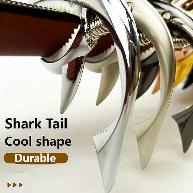 Каподастр гітарний, універсальний для акустичних та електрогітар. Срібне забарвлення, силікон, алюміній. З мішком. - 2 фото товару