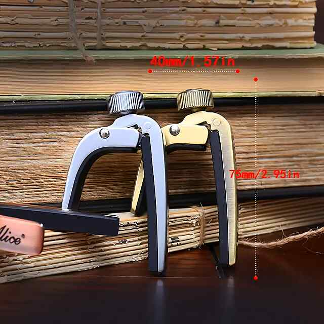 Каподастр на гітару - зручний та надійний подарунок музиканту. Цинковий сплав, м'які вставки. Вкладка. - 2 фото товару