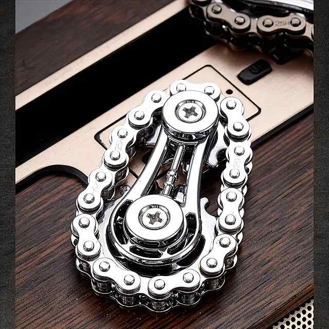 Металевий EDC спінер - антистрес зірочки на ланцюгах, для концентрації, плавно обертається. - 3 фото товару